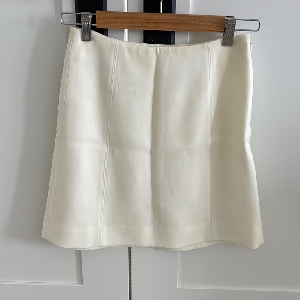 Babaton Cream mini skirt (size 2)